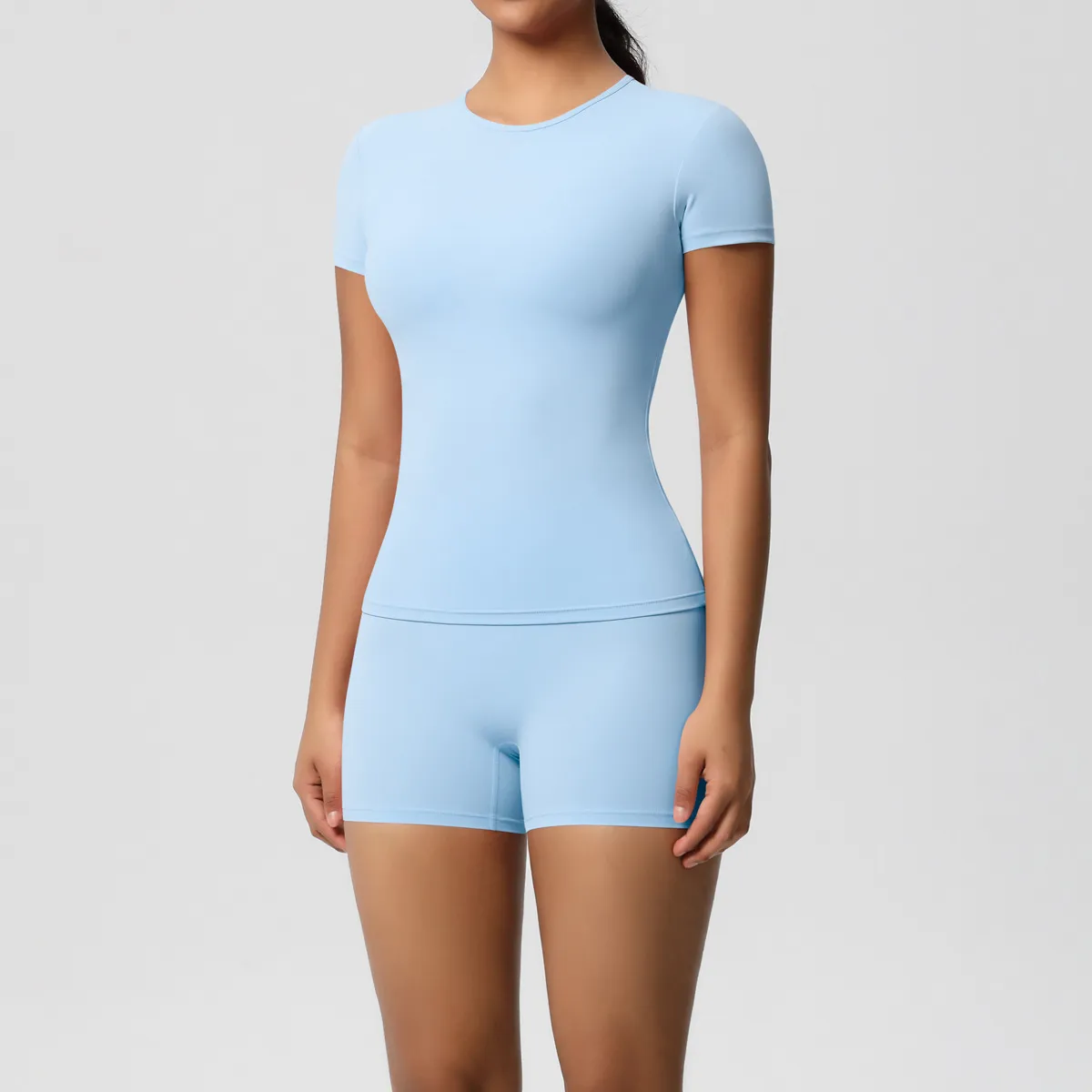 Women Fashion Casual Solid Color Short-Sleeve T-Shirt Tight Shorts Yoga Sports Two-Piece Set - Image 4