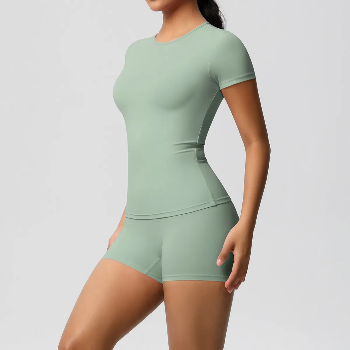 Women Fashion Casual Solid Color Short-Sleeve T-Shirt Tight Shorts Yoga Sports Two-Piece Set - Image 9