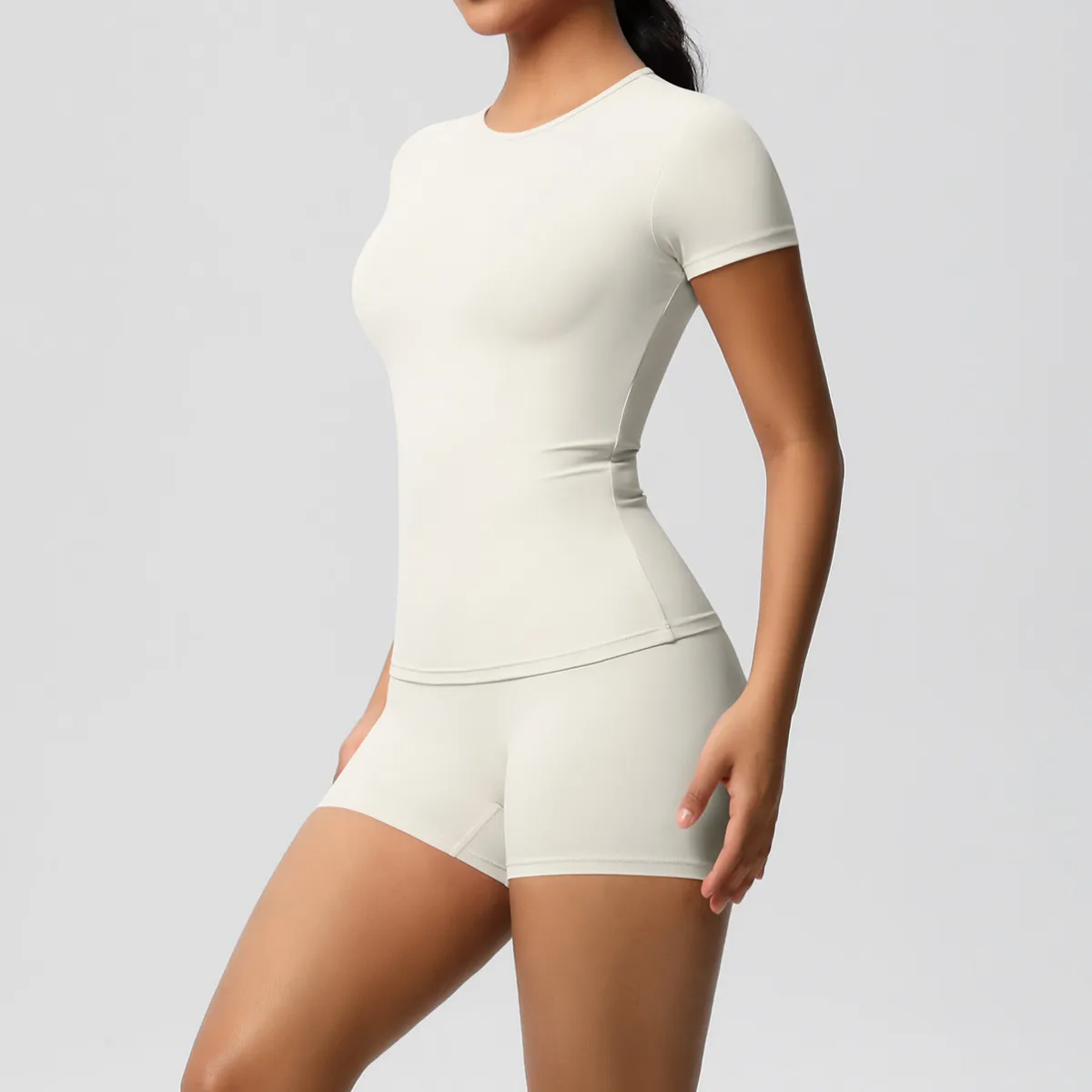 Women Fashion Casual Solid Color Short-Sleeve T-Shirt Tight Shorts Yoga Sports Two-Piece Set - Image 10