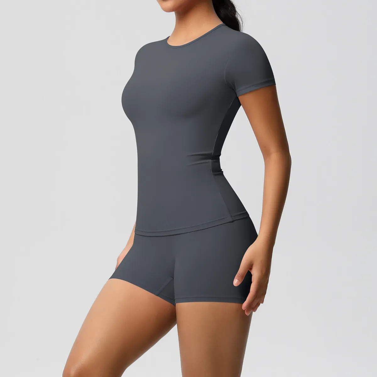Women Fashion Casual Solid Color Short-Sleeve T-Shirt Tight Shorts Yoga Sports Two-Piece Set - Image 11