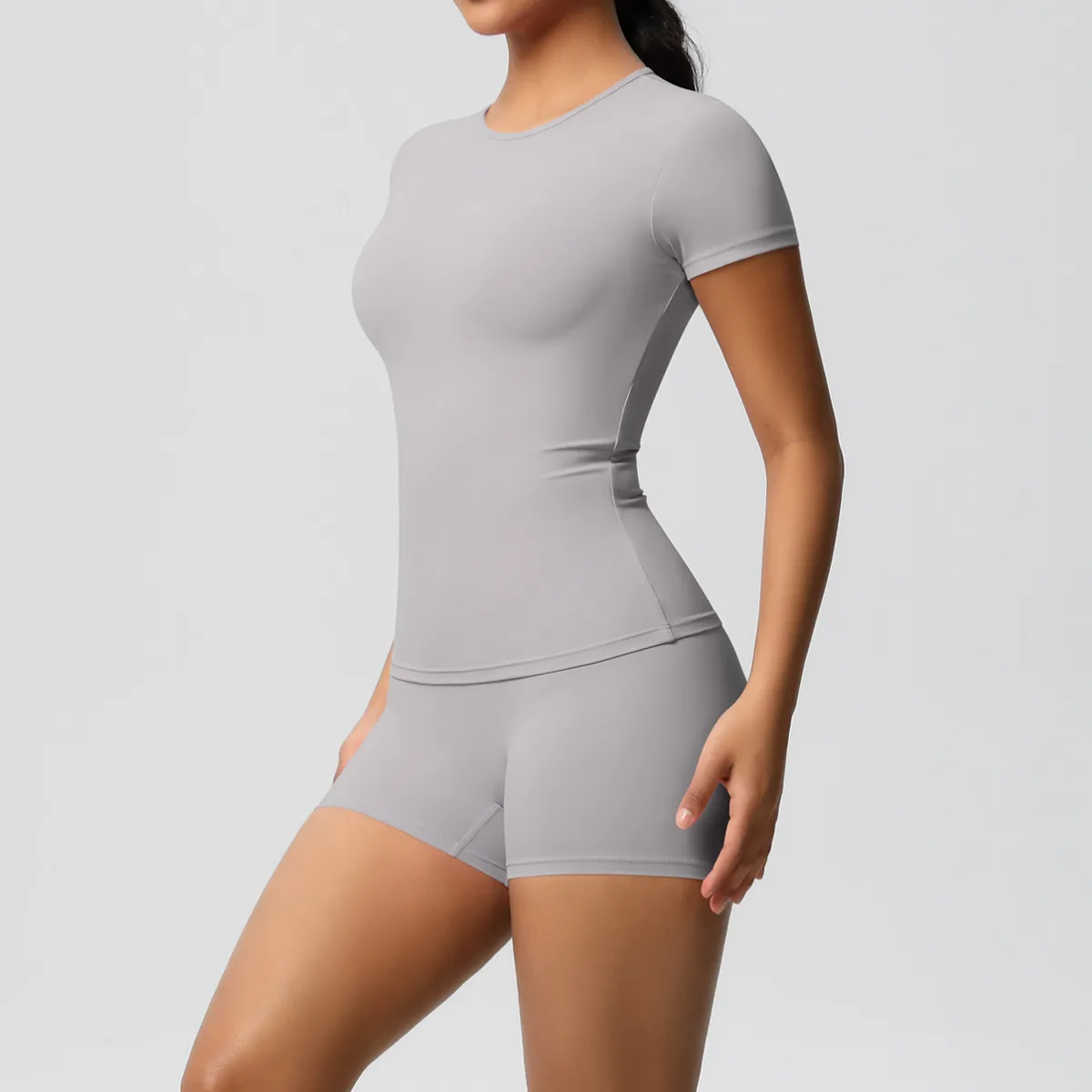Women Fashion Casual Solid Color Short-Sleeve T-Shirt Tight Shorts Yoga Sports Two-Piece Set - Image 12