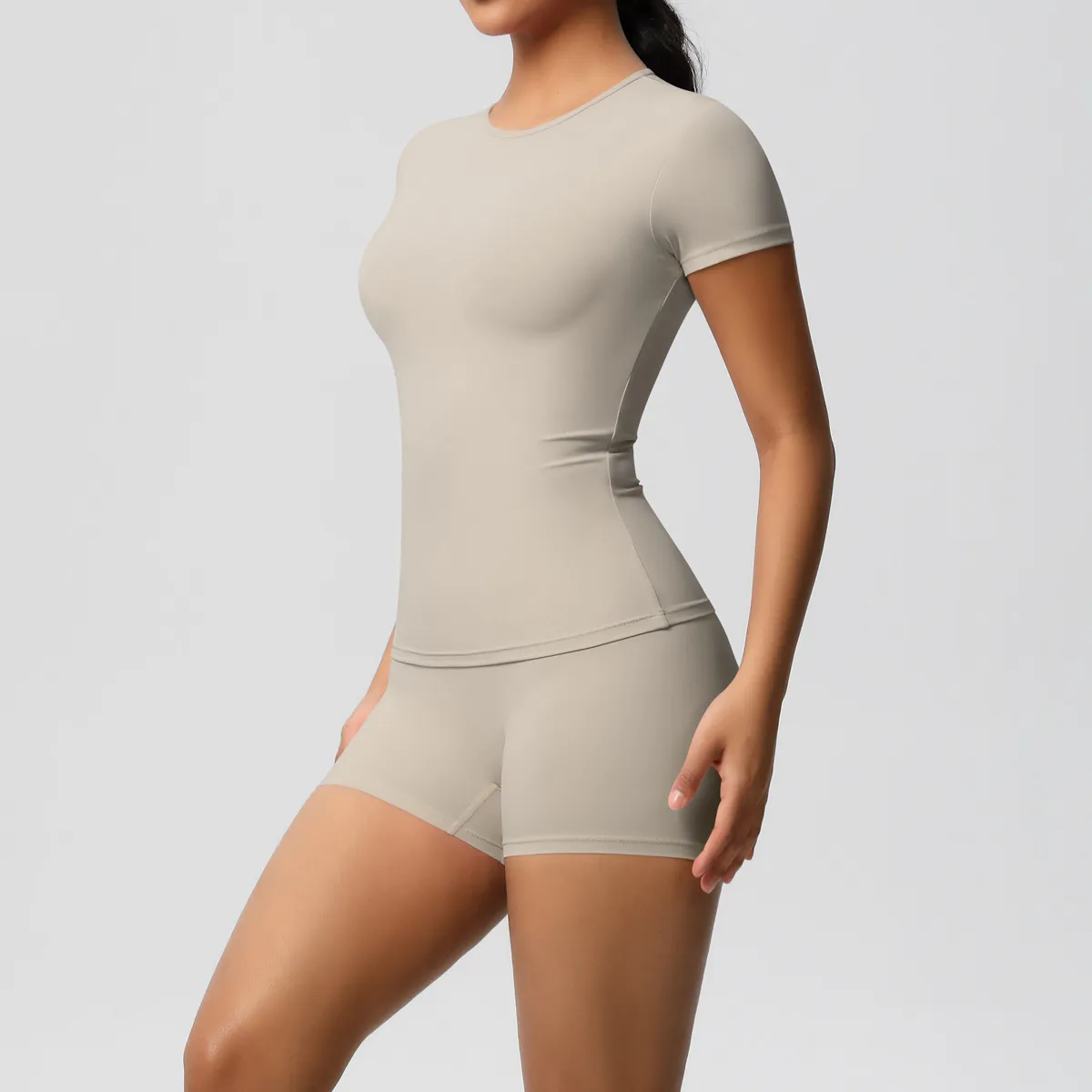 Women Fashion Casual Solid Color Short-Sleeve T-Shirt Tight Shorts Yoga Sports Two-Piece Set - Image 17