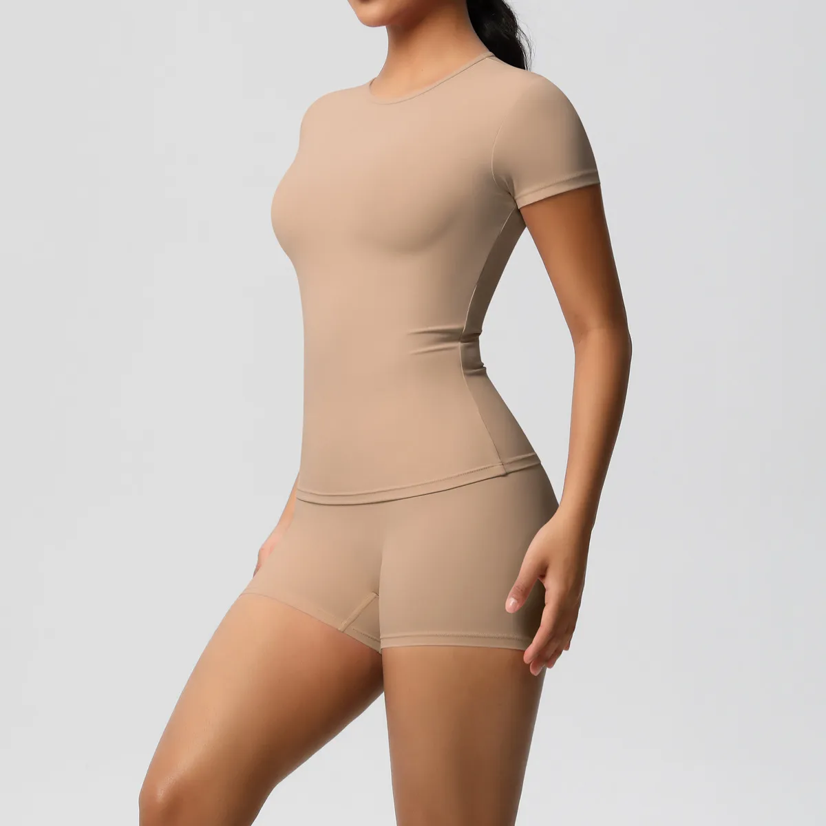 Women Fashion Casual Solid Color Short-Sleeve T-Shirt Tight Shorts Yoga Sports Two-Piece Set - Image 20