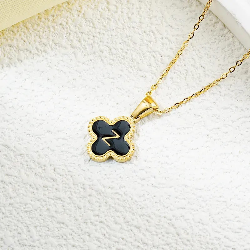 Wholesale Fashion Clover 26 Letter Black White Fritillaria Necklace - Image 54